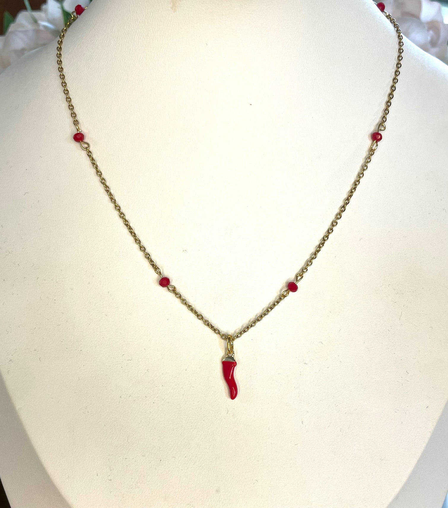 Girocollo catena dorata con inserti in cristallo e soggetto smaltato